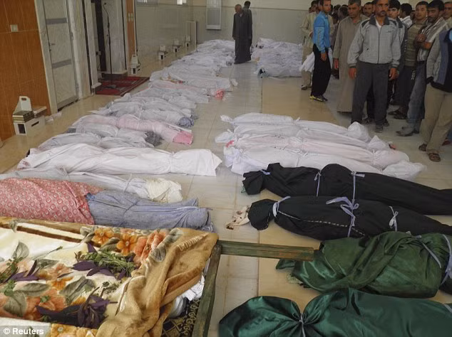Thi thể của những người bị tàn sát bởi các lực lượng an ninh ở Syria. Thi thể của những người bị tàn sát bởi các lực lượng an ninh ở Syria.