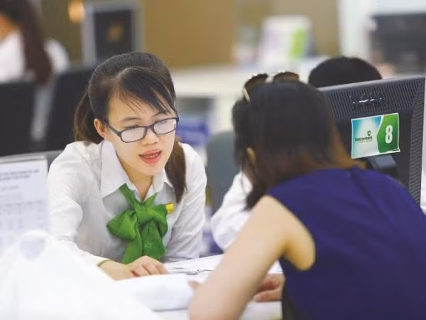 Giao dịch tại Vietcombank. (Nguồn: Vietcombank). Giao dịch tại Vietcombank. (Nguồn: Vietcombank).