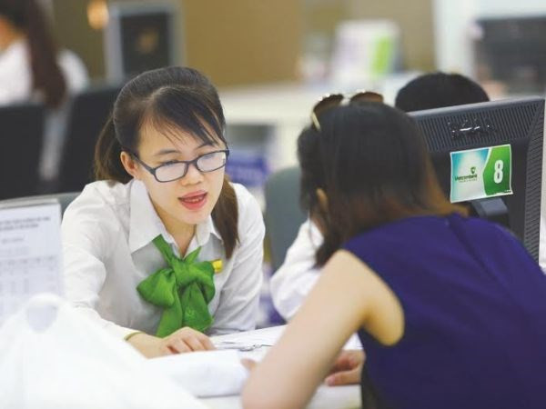 Giao dịch tại Vietcombank. (Nguồn: Vietcombank). Giao dịch tại Vietcombank. (Nguồn: Vietcombank).