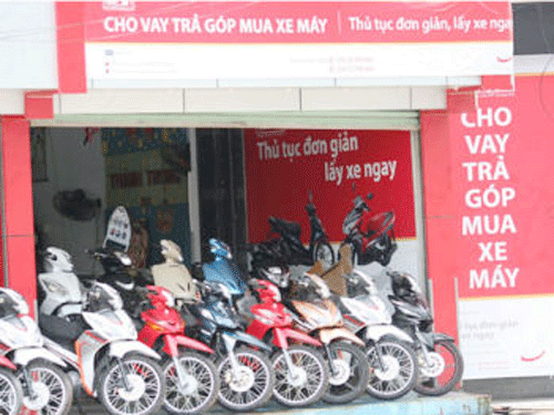 Cho vay trả góp đang trở thành một “chiêu” kích cầu tiêu dùng trong bối cảnh kinh tế khó khăn. (Ảnh minh họa) Cho vay trả góp đang trở thành một “chiêu” kích cầu tiêu dùng trong bối cảnh kinh tế khó khăn. (Ảnh minh họa)