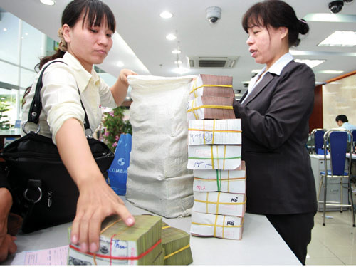 Kiến nghị đánh thuế thu nhập từ tiền gửi tiết kiệm của HoREA là lợi bất cập hại - Ảnh: Ngọc Thắng