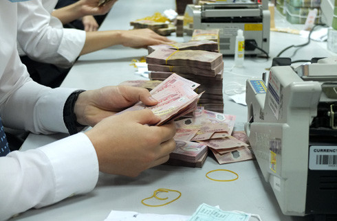 Các ngân hàng lớn dễ tiếp cận vốn rẻ trong khi các nhà băng nhỏ lại vô cùng khó khăn. Ảnh: Thanh Lan. Các ngân hàng lớn dễ tiếp cận vốn rẻ trong khi các nhà băng nhỏ lại vô cùng khó khăn. Ảnh: Thanh Lan.