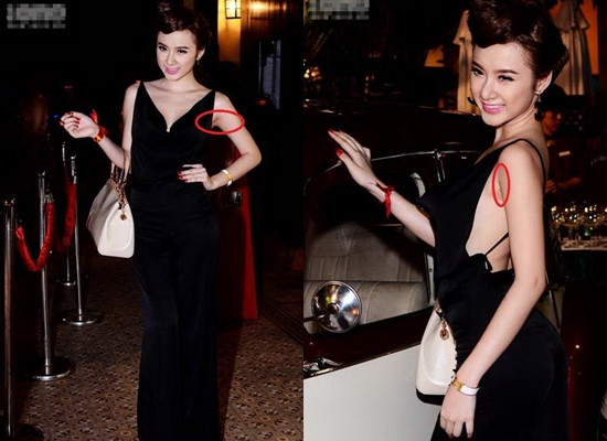 Khi một số trang mạng đưa tấm hình này kèm theo "nghi án" Phương Trinh nâng ngực, Angela tuyên bố sẽ thưởng 1 tỷ cho ai tìm thấy sẹo nâng ngực kèm theo lời mời gặp trực tiếp để tìm sẹo. “Bà mẹ nhí” thẳng thừng tuyên bố: "Nếu ai không tin lời tôi vừa nói, tôi có thể mời họ đến gặp trực tiếp để kiểm tra nách của mình. Tôi không ngại đâu. Đặc biệt, nếu ai phát hiện ra dưới nách tay tôi có một vết sẹo nào, dù là sẹo nhỏ, tôi sẽ thưởng ngay cho họ 1 tỷ đồng cảm ơn". Khi một số trang mạng đưa tấm hình này kèm theo "nghi án" Phương Trinh nâng ngực, Angela tuyên bố sẽ thưởng 1 tỷ cho ai tìm thấy sẹo nâng ngực kèm theo lời mời gặp trực tiếp để tìm sẹo. “Bà mẹ nhí” thẳng thừng tuyên bố: "Nếu ai không tin lời tôi vừa nói, tôi có thể mời họ đến gặp trực tiếp để kiểm tra nách của mình. Tôi không ngại đâu. Đặc biệt, nếu ai phát hiện ra dưới nách tay tôi có một vết sẹo nào, dù là sẹo nhỏ, tôi sẽ thưởng ngay cho họ 1 tỷ đồng cảm ơn".