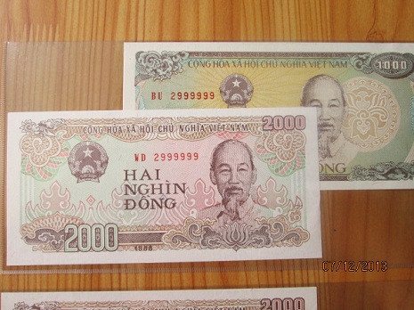 Cặp tiền mệnh giá 1.000 đồng và 2.000 đồng trùng số series được rao bán với giá 500.000 đồng.