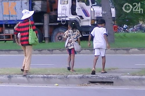 Cận cảnh nạn chăn dắt trẻ tại TP.HCM ảnh 8 Cận cảnh nạn chăn dắt trẻ tại TP.HCM, Tin tức trong ngày, chan dat tre an xin, tap doan an xin, an xin co to chuc, cai bang, to chuc cai bang, an xin o tphcm, an xin duong pho, bao, tin nhanh, tin hot, tin tuc, vn