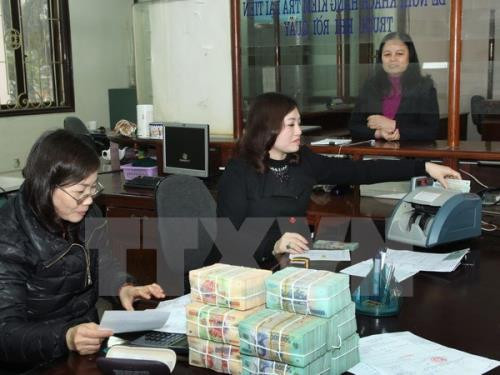 Câu chuyện thưởng Tết luôn được giáo viên quan tâm mỗi khi Tết đến (Ảnh minh họa TTXVN)