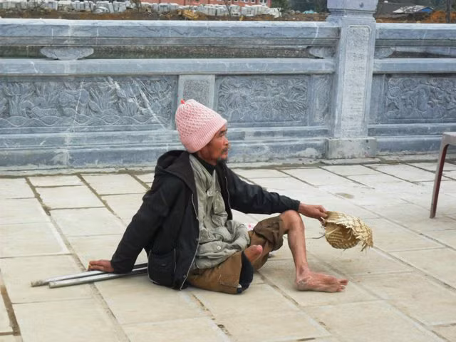 Dịch vụ đổi tiền lẻ và “cái bang” vây chùa Bái Đính ảnh 3 Dịch vụ đổi tiền lẻ và “cái bang” vây chùa Bái Đính ảnh 3