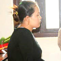 Trang lạnh lùng tại phiên tòa