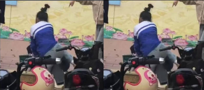 Hai nữ sinh xảy ra xô xát ngay trong sân trường. Ảnh cắt từ clip. 5.jpg