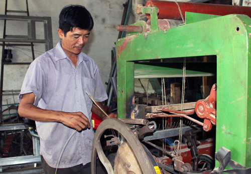 Trần Văn Phong - nhà sáng chế bất đắc dĩ - Ảnh: Ngọc Minh Trần Văn Phong - nhà sáng chế bất đắc dĩ - Ảnh: Ngọc Minh