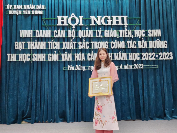 Cô giáo Hoàng Thị Hồng Ngọc, giáo viên dạy môn Toán Trường Trung học cơ sở thị trấn Nham Biền số 1 (Bắc Giang). Ảnh: NVCC. ad-4nxc8q0jahrtqmyktklt8ksf8qmkzpfikksfkqlr6phugmzkl3lmip-p78r3njfmy8icpig1epkbqdgfyfve3wja3cwqr75rk40dg1hyc7g3fla31ufs66-if7nu3rlvxk93bputexctlu58qdy-ik6hu1rk-9369.jpg