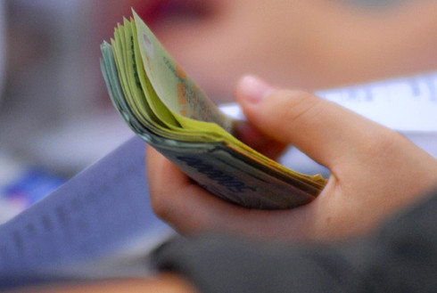 Sẽ có 2,87 triệu người được đưa khỏi diện chịu thuế thu nhập khi áp dụng luật mới. Ảnh: Hoàng Hà