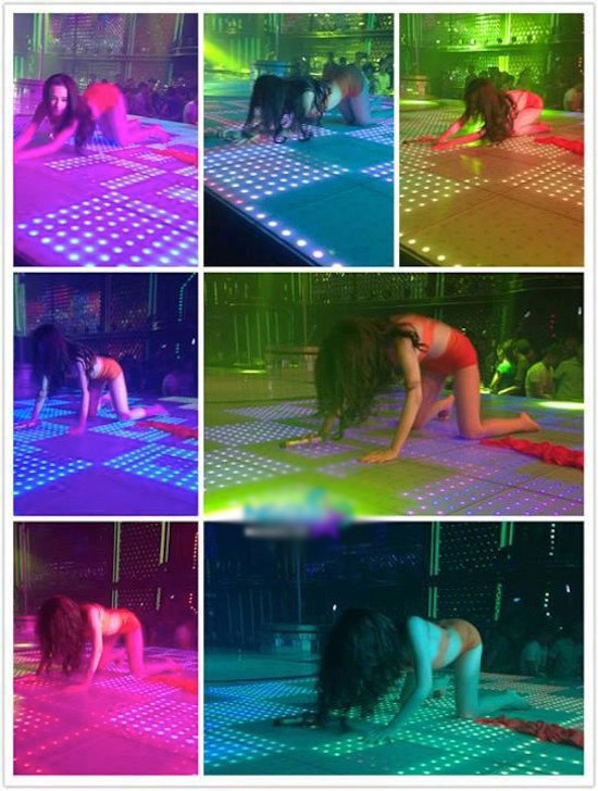 Angela Phương Trinh còn lộ một loạt ảnh được chụp tại một buổi biểu diễn trong bar gây xôn xao trong cộng đồng mạng. Giống như lần xuất hiện trước, lần này Angela Phương Trinh biểu diễn với trang phục sexy, kiệm vải. Tuy nhiên, cô không biểu diễn màn múa cột bốc lửa như lần trước mà thay vào đó là màn lăn lê, bò toài phản cảm.