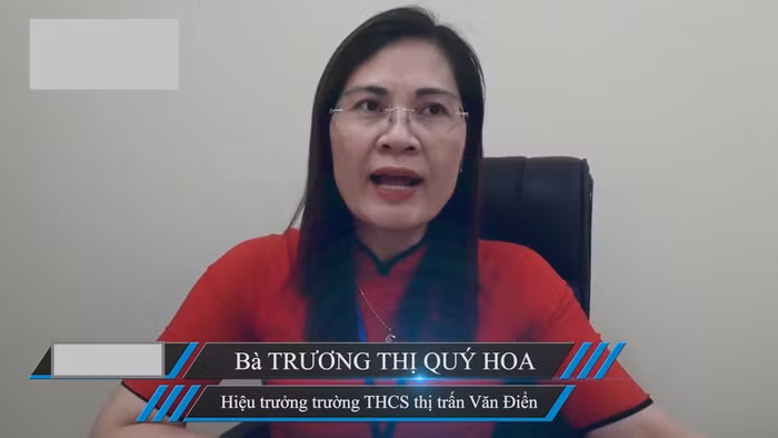 Cô Trương Thị Quý Hoa, Hiệu trưởng Trường Trung học cơ sở Thị trấn Văn Điển từ chối trả lời báo chí và cũng không bình luận gì về thông tin phụ huynh phản ánh. Ảnh: Người Đưa Tin.
