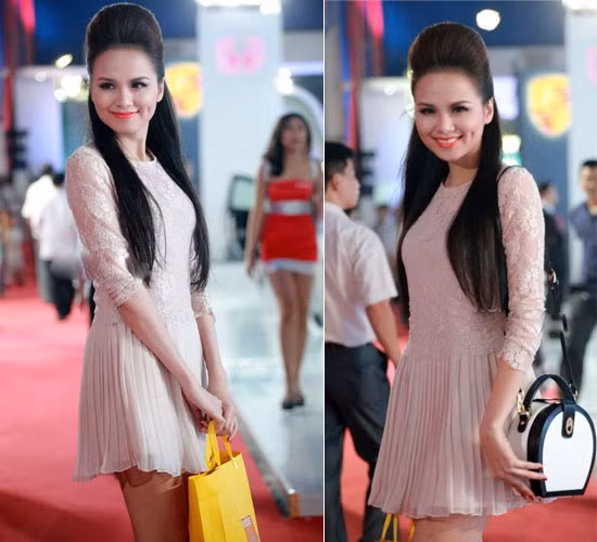 Váy ren kết hợp chất liệu voan tông màu nhã nhặn giúp Diễm Hương toát lên vẻ dịu dàng và nữ tính