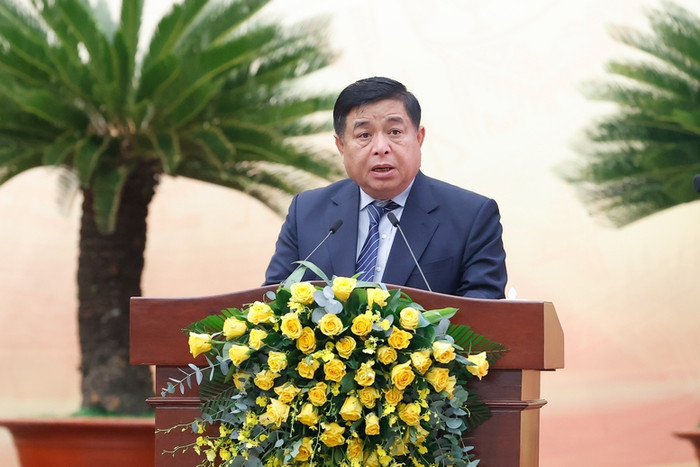 Bộ trưởng Bộ Kế hoạch và Đầu tư Nguyễn Chí Dũng phát biểu tại hội nghị. Ảnh: VGP/Nhật Bắc