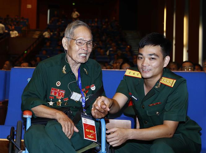 Giao lưu với các đại biểu là thương binh nặng. Ảnh: Thống Nhất/TTXVN Giao lưu với các đại biểu là thương binh nặng. Ảnh: Thống Nhất/TTXVN