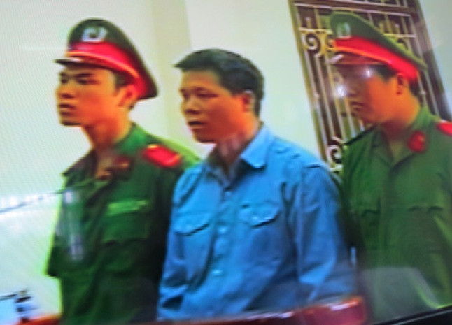 Đoàn Văn Quý đứng trước tòa - Ảnh chụp lại màn hình Đoàn Văn Quý đứng trước tòa - Ảnh chụp lại màn hình