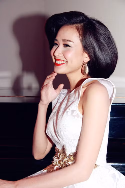 Mái tóc phồng kiểu cách của Dương Mỹ Linh không được đánh giá cao.