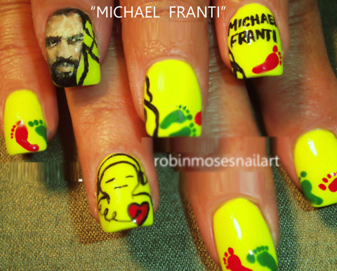 Nhà soạn nhạc người Mỹ Michael Franti. Nhà soạn nhạc người Mỹ Michael Franti.