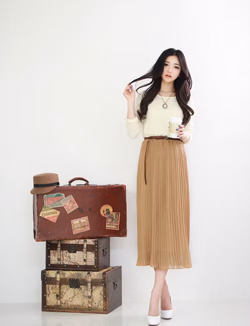 Xác định chiều dài của váy và các chi tiết trên váy để giúp tôn vóc dáng đối với người thấp bé