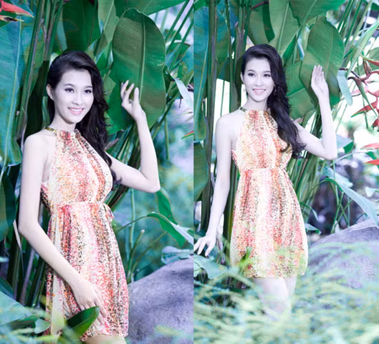 Váy họa tiết nền nã cùng phần cổ áo may dạng yếm cách điệu tôn vóc dáng thanh mảnh của người đẹp.