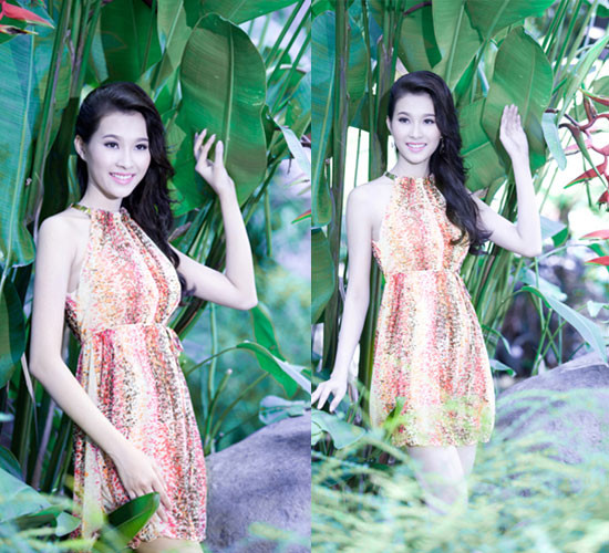 Váy họa tiết nền nã cùng phần cổ áo may dạng yếm cách điệu tôn vóc dáng thanh mảnh của người đẹp. Váy họa tiết nền nã cùng phần cổ áo may dạng yếm cách điệu tôn vóc dáng thanh mảnh của người đẹp.