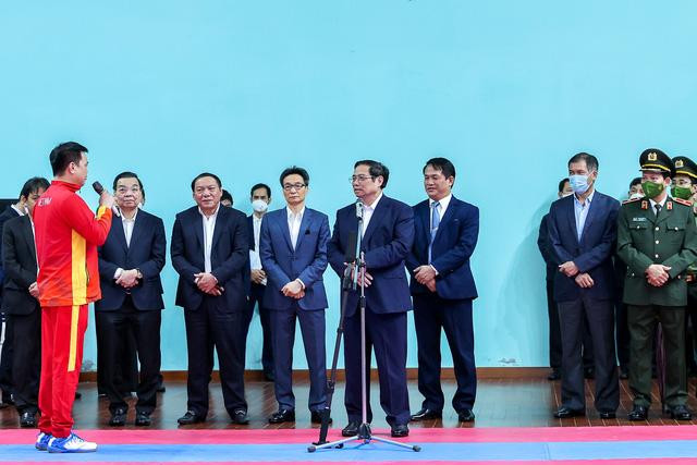 Đại diện các vận động viên xin hứa sẽ nỗ lực tập luyện hết mình, thi đấu vì ‘màu cờ, sắc áo’ mang vinh quang về cho Tổ quốc - Ảnh: VGP/Nhật Bắc Đại diện các vận động viên xin hứa sẽ nỗ lực tập luyện hết mình, thi đấu vì ‘màu cờ, sắc áo’ mang vinh quang về cho Tổ quốc - Ảnh: VGP/Nhật Bắc