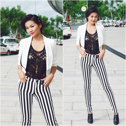 Thanh Hằng "mượn" vest khoe khoảng hở gợi cảm cùng áo ren đen bên trong