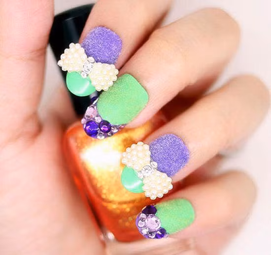 Nơ xinh cho nail nhung thêm đáng yêu.