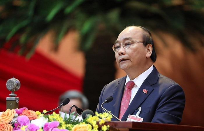 Ủy viên Bộ Chính trị, Thủ tướng Chính phủ Nguyễn Xuân Phúc thay mặt Đoàn Chủ tịch đọc Diễn văn khai mạc Đại hội. (Ảnh: TTXVN) Ủy viên Bộ Chính trị, Thủ tướng Chính phủ Nguyễn Xuân Phúc thay mặt Đoàn Chủ tịch đọc Diễn văn khai mạc Đại hội. (Ảnh: TTXVN)