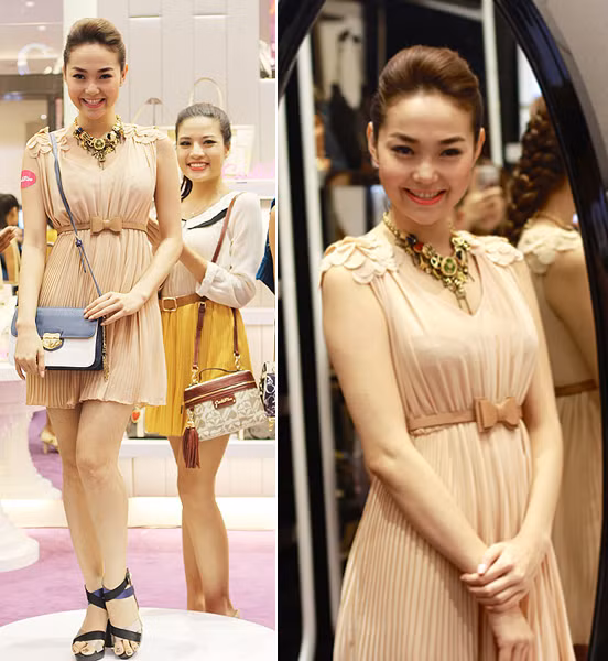 Thắt lưng có tone màu đậm hơn so với váy quả là một lựa chọn thông minh của Minh Hằng.