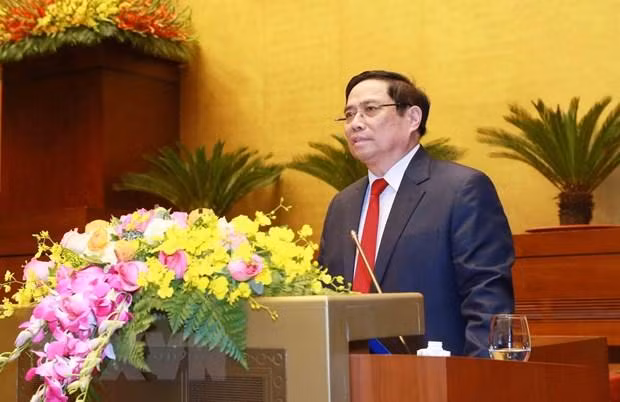 Trưởng Ban Tổ chức Trung ương Phạm Minh Chính giới thiệu, quán triệt chuyên đề: “Báo cáo tổng kết công tác xây dựng Đảng và thi hành Điều lệ Đảng của Ban Chấp hành Trung ương khóa XII tại Đại hội XIII của Đảng.” (Ảnh: Phương Hoa/TTXVN)