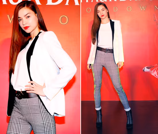 Hà Hồ diện áo blazer trắng cùng quần kẻ bó sát khoe vóc dáng mảnh mai và đặc biệt cô mặc kín vẫn rất quyến rũ