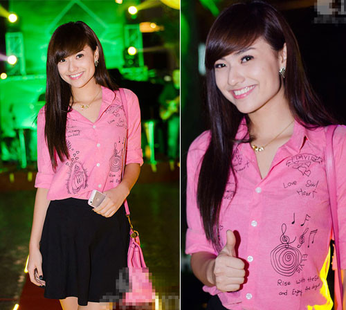 Hồng Quế tươi mới và đáng yêu khi diện sơ mi hồng cùng váy đen.