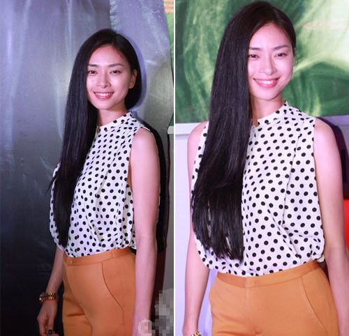 Ngô Thanh Vân diện áo chấm bi sơ mi cổ trụ ba lỗ rất mát mẻ.