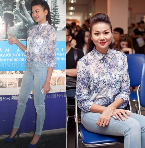 Áo sơ mi hoa văn nhẹ nhàng được Thanh Hằng mix cùng quần jeans bó và giày cao gót, tuy đơn giản nhưng lại chẳng kém phần hút hồn.