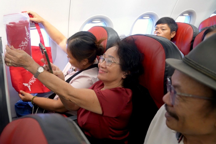 Hành khách trên chuyến bay từ Buôn Ma Thuột đến Vinh của Vietjet. A8.jpg