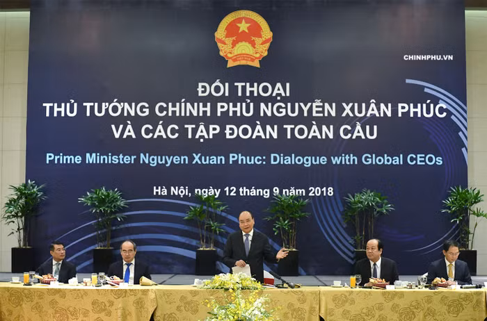 Thủ tướng đối thoại với các tập đoàn toàn cầu. Ảnh: VGP/Quang Hiếu