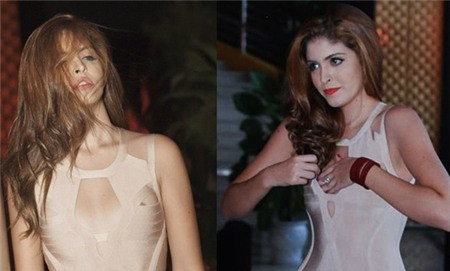 Andrea mải mê chỉnh sửa áo váy không ngại ngần. Andrea mải mê chỉnh sửa áo váy không ngại ngần.