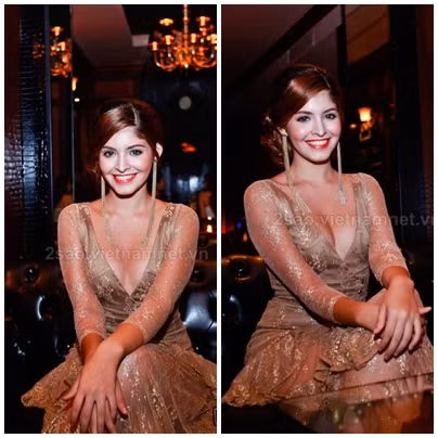 Chiếc váy khoét cổ chữ V điểm kim sa đã "tố cáo" phần xương vai và bắp tay thô to của cô nàng.