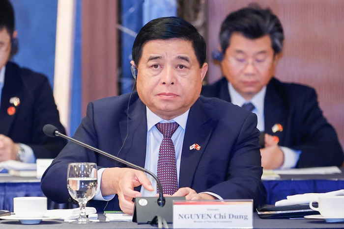Giải đáp về các vấn đề về đầu tư, Bộ trưởng Bộ Kế hoạch và Đầu tư Nguyễn Chí Dũng đánh giá cao đóng góp của doanh nghiệp Hàn Quốc đối với sự phát triển của Việt Nam. Ảnh: VGP/Nhật Bắc bt.jpg