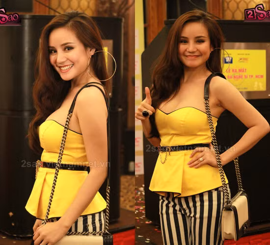 Vy Oanh nổi bật với áo vàng quây khoe ngực tròn đầy và diện hoa tai tròn ngoại cỡ.