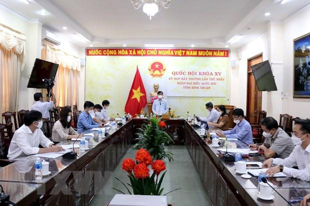 Đại biểu Quốc hội tỉnh Bình Thuận thảo luận tại tổ. (Ảnh: Nguyễn Thanh/TTXVN)