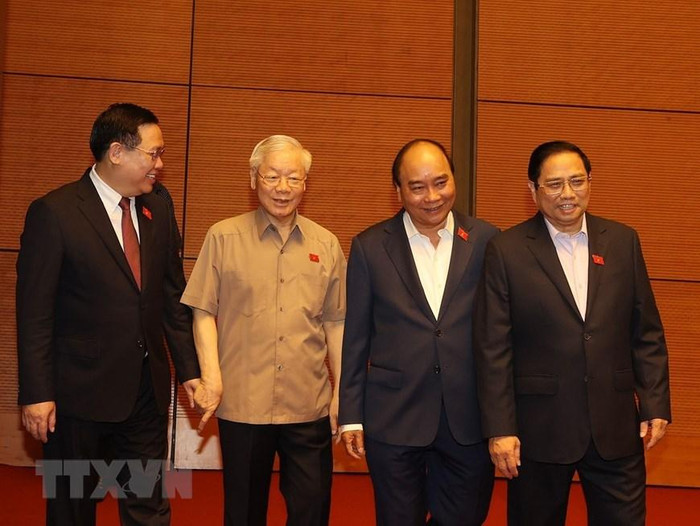 Tổng Bí thư Nguyễn Phú Trọng, Chủ tịch nước Nguyễn Xuân Phúc, Thủ tướng Chính phủ Phạm Minh Chính, Chủ tịch Quốc hội Vương Đình Huệ dự phiên họp. (Ảnh: Trí Dũng/TTXVN)