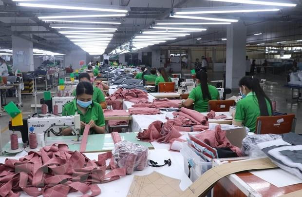 Gói hỗ trợ của Chính phủ đã góp phần hỗ trợ doanh nghiệp vượt qua khó khăn, khôi phục sản xuất. (Ảnh: TTXVN)