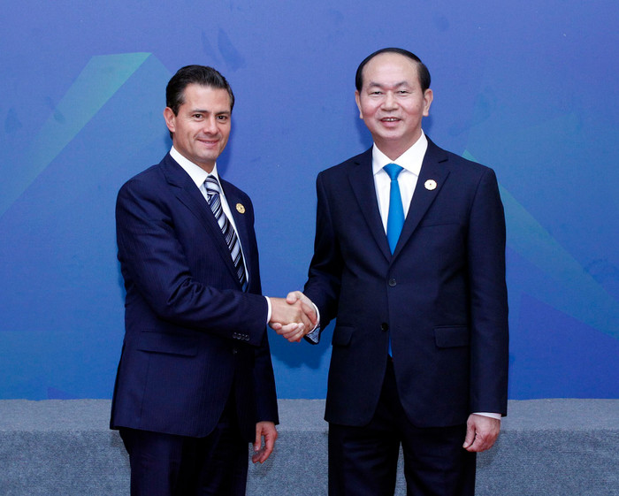 Chủ tịch nước Trần Đại Quang đón Tổng thống Mexico Enrique Pena Nieto đến dự Đối thoại. Chủ tịch nước Trần Đại Quang đón Tổng thống Mexico Enrique Pena Nieto đến dự Đối thoại.
