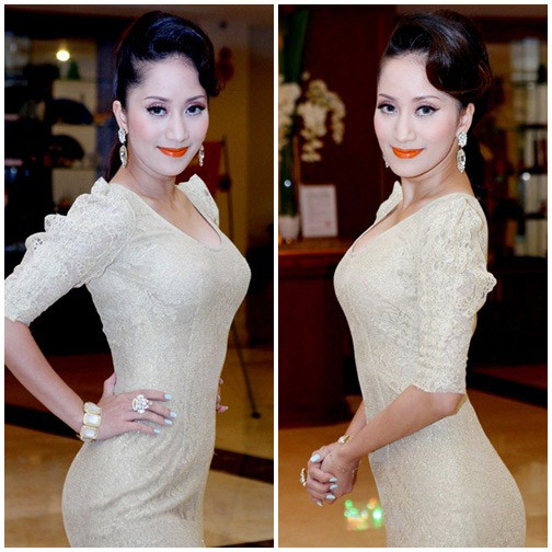 Chiếc váy ren màu nude ôm sát giúp tôn lên vùng hông quyến rũ và gợi cảm