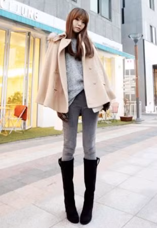 Thêm một cách mix boot cổ cao với áo cape