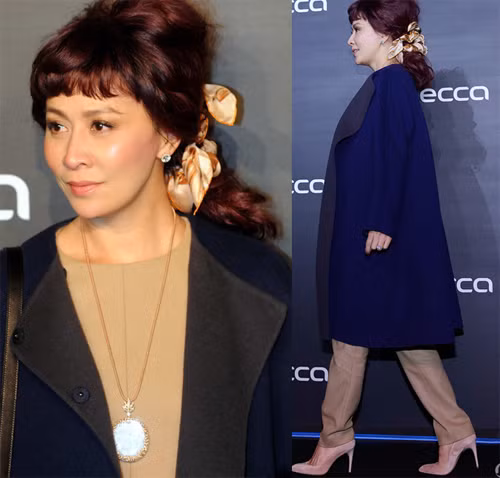 Muốn có vẻ đẹp lãng mạn, cổ điển của những năm 1950-1960, Lưu Gia Linh đội lên đầu máu tóc giả màu nâu đồng bóng bẩy và tô điểm thêm bằng chiếc dây hoa vàng gợi cảm giác thơ mộng. Ngay trong sự kiện, cô bị người dẫn chương trình hỏi: "Kiểu tóc này có quá trẻ so với Gia Linh?", nữ diễn viên đưa ra câu trả lời không ăn nhập lắm với câu hỏi: "Tôi để kiểu đầu nào thì ông xã Lương Triều Vỹ cũng thích".